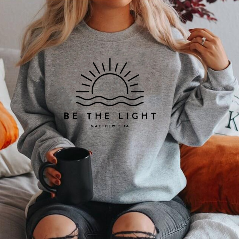 Sophia - Stylish Sweater ‘Be The Light’